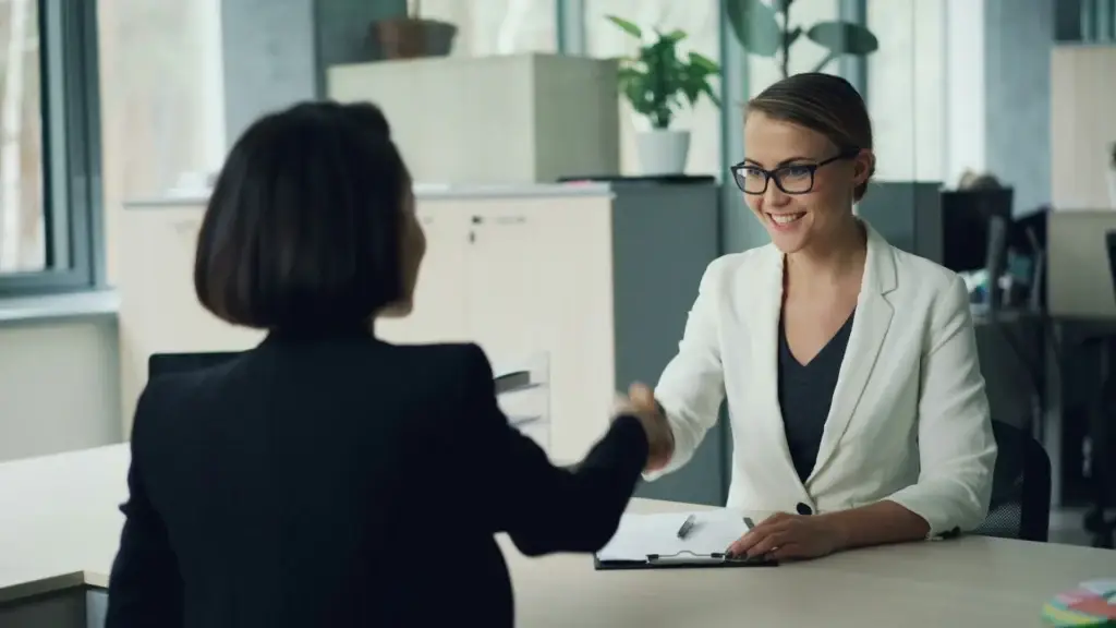 Businesswomen shaking hands after a recruitment meeting